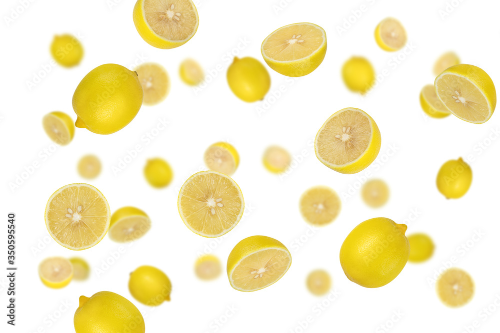 Falling lemons isolated on a white background with clipping path as package design element and advertising. Top view Falling lemons isolated on a white background with clipping path as package design element and advertising. Top view