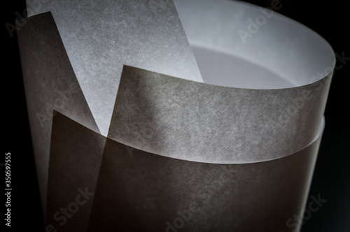 Abstract spiral sheets of rolled white paper - Minimalistic background