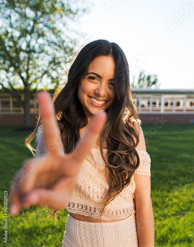 Beautiful Young Woman Peace Sign Portrait