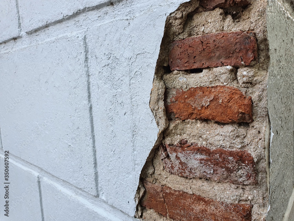 Exterior wall cracks such as cracks in the brickwork, surface or ...