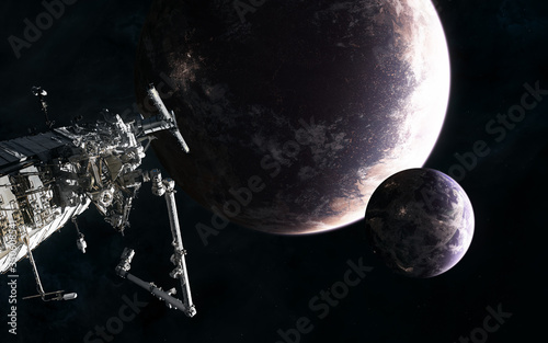 Fototapeta Naklejka Na Ścianę i Meble -  Space station on background of inhabited planets in deep space. Science fiction. Elements of this image furnished by NASA