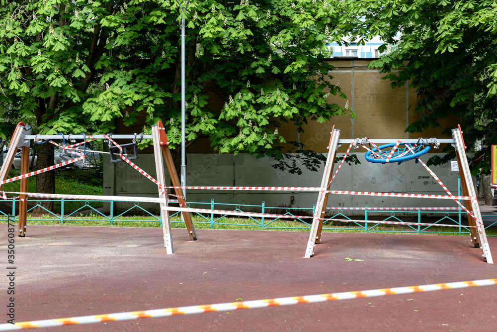 Moscow Russia: Closed children's playground as a measure to prevent spread of coronavirus COVID-19. No children on the Playground in the yard.