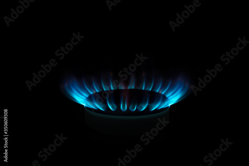 gas stove comfort with flame, on black background