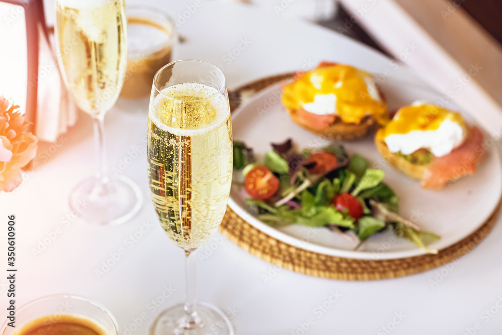 Sunday brunch with prosecco and eggs benedict Sunday brunch with prosecco and eggs benedict