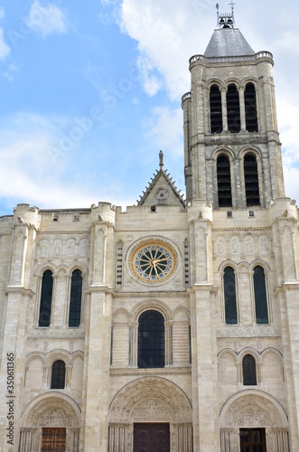 Basilica of Saint-Denis or Basilique royale de Saint-Denis. Facade and bell tower. Paris, France.