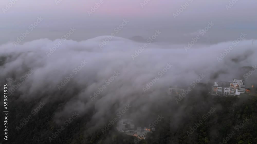 Waterfall of clouds on a mountain Waterfall of clouds on a mountain