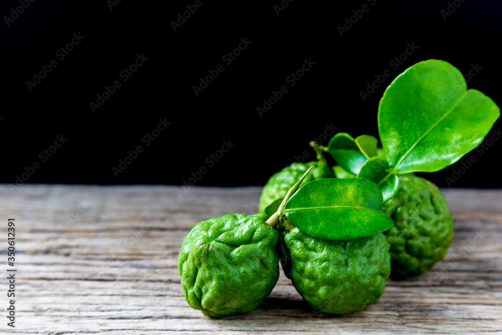Bergamot has leaves placed on a wooden floor.
Bergamot has leaves placed on a wooden floor.