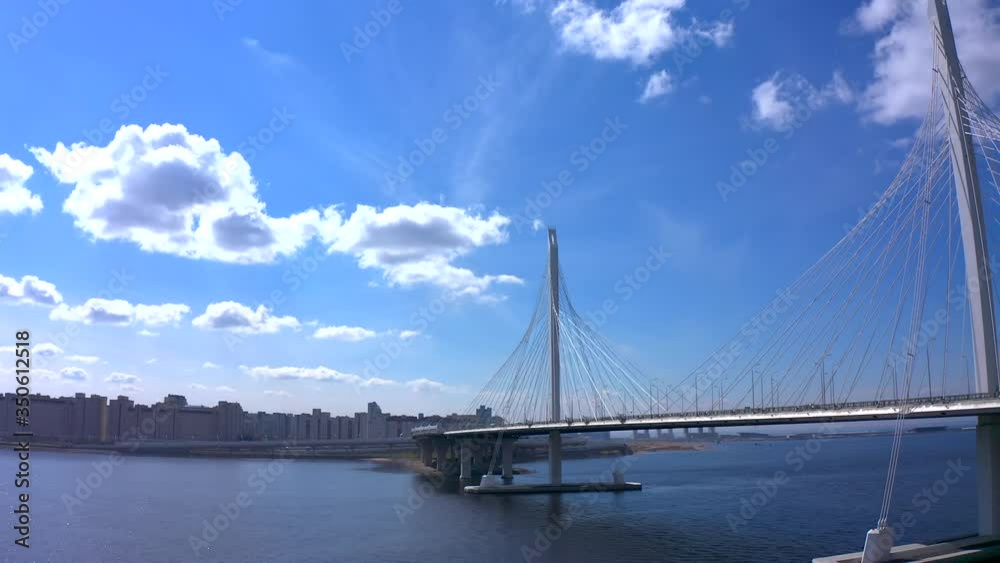 Aerial view of the bridge over the Petrovsky fairway. Western high-speed diameter of St. Petersburg. Drone flight over the city on a sunny day. Aerial view of the bridge over the Petrovsky fairway. Western high-speed diameter of St. Petersburg. Drone flight over the city on a sunny day.