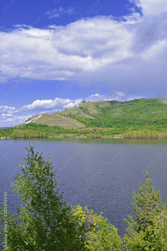 Beautiful summer landscape.Wide river and mountains.