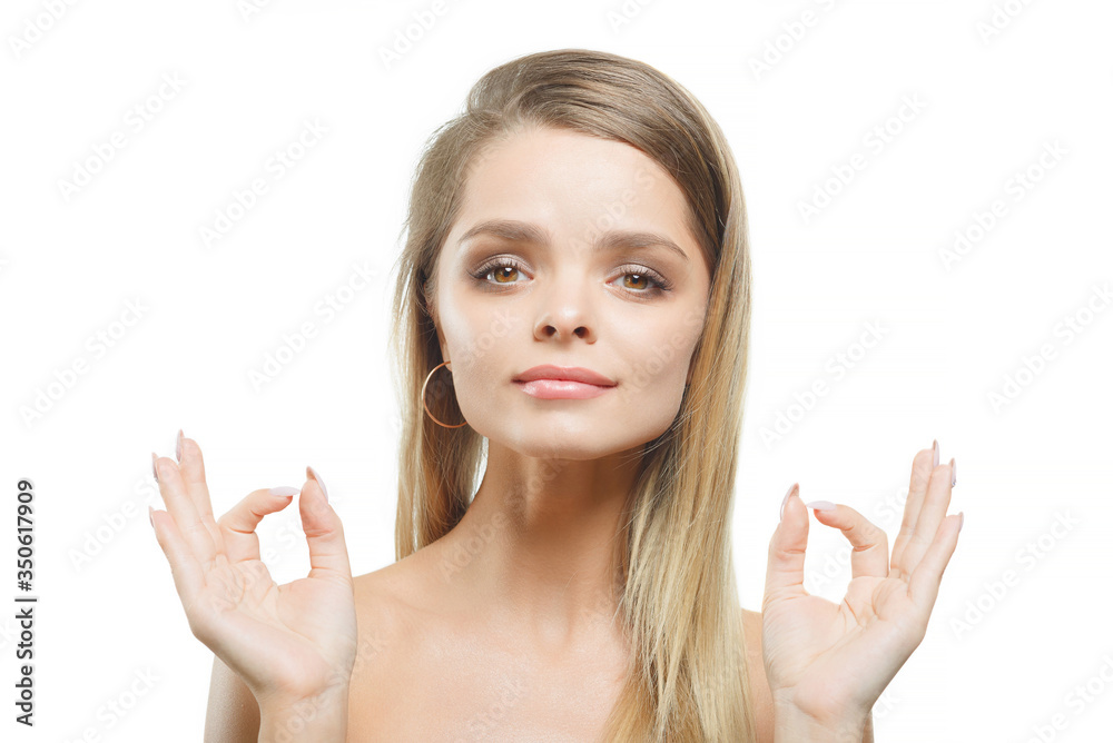 The girl shows the gesture everything is fine on a white background. The girl shows the gesture everything is fine on a white background.