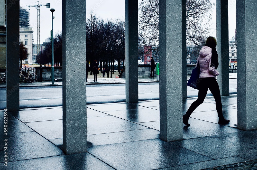 young woman walking in the city