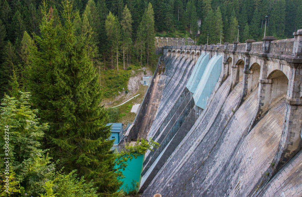 Dam In Forest In Northern Italy.