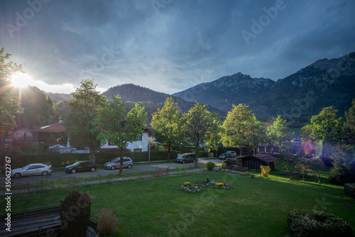 The small Bavarian town of Bad Reichenhall before rain in the Alps in spring before sunset.
