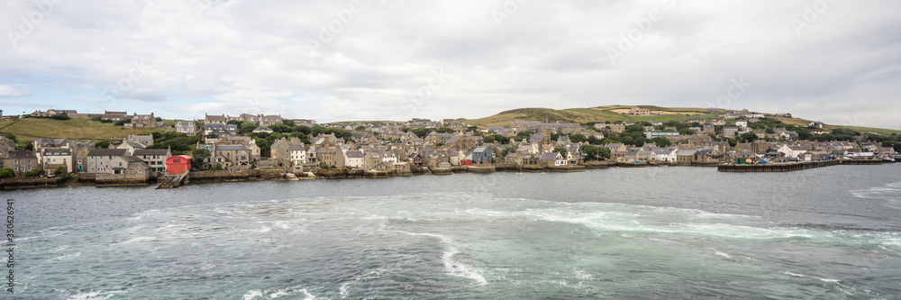 panorama of the historic village Stromness on Orkney mainland, Scotland, Uk. Seaside view of this fisherman town and a harbour at Hoy sound