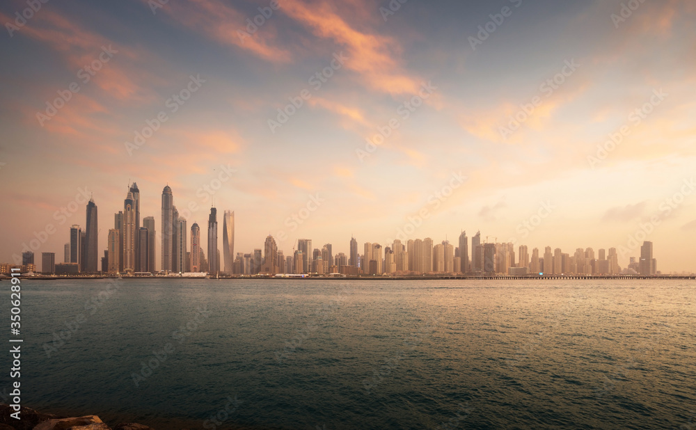 skyscrapers in Dubai Marina, sunset time, UAE