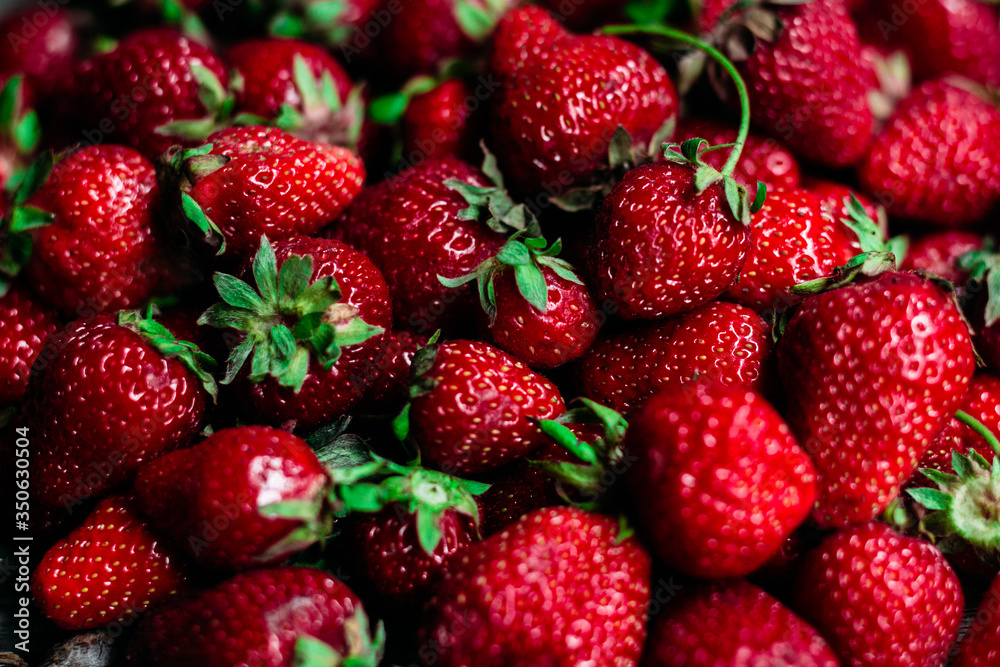 Strawberry closeup on a wooden table