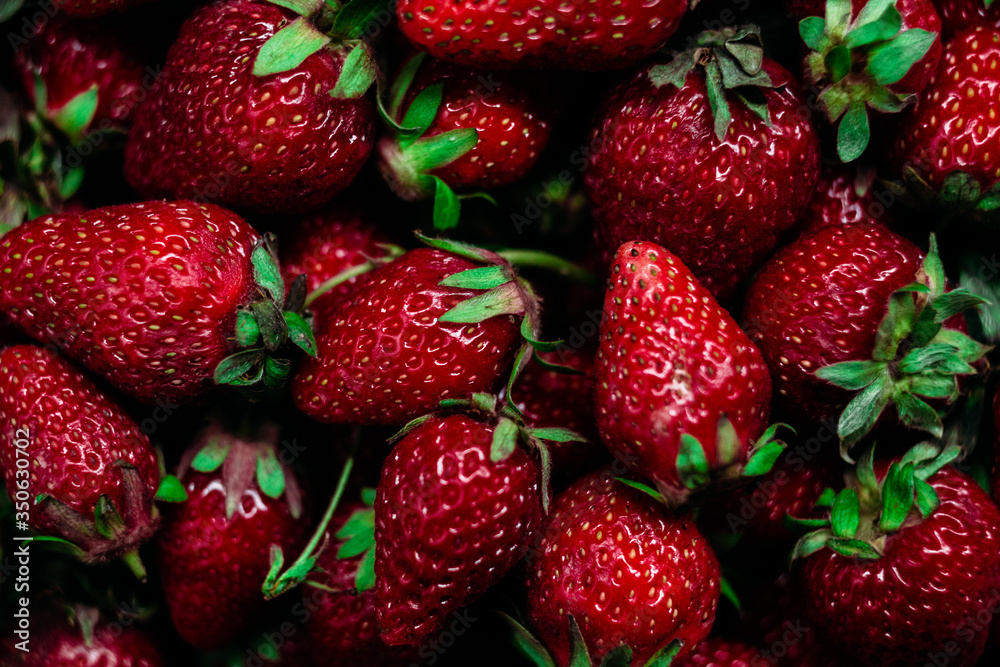 Strawberry closeup on a wooden table Strawberry closeup on a wooden table