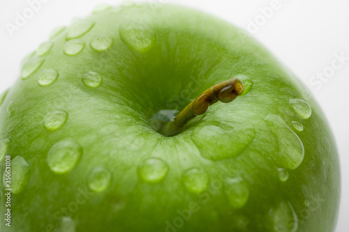 Green Apple on an isolated white background. Proper nutrition. Diet. 