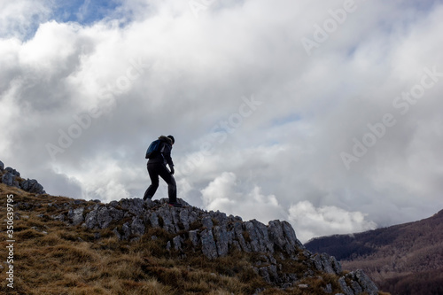 woman hiker on mountain peak