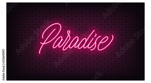 Pink neon Paradise, lettering. Neon text of Paradise on black brick background