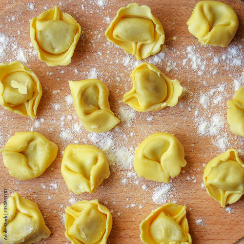 pasta tortellini with filling Menu concept healthy eating. food background top view copy space for text healthy eating table setting