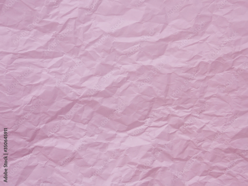 Pastel pink crumpled paper texture background Pastel pink crumpled paper texture background