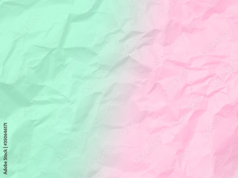 Crumpled mint and pink paper texture background