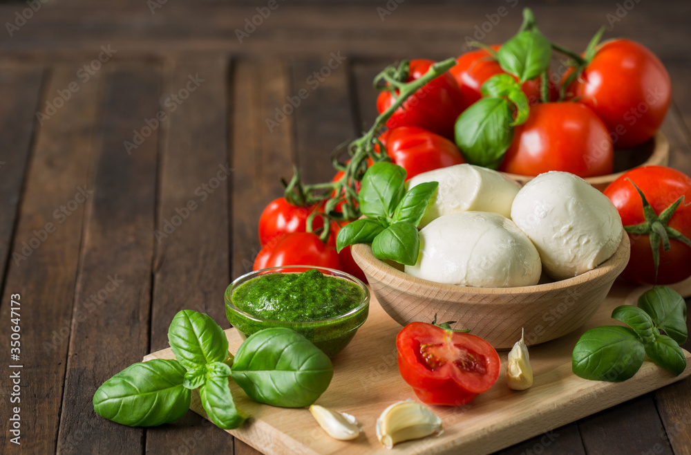 Fresh mozzarella cheese with basil and tomato