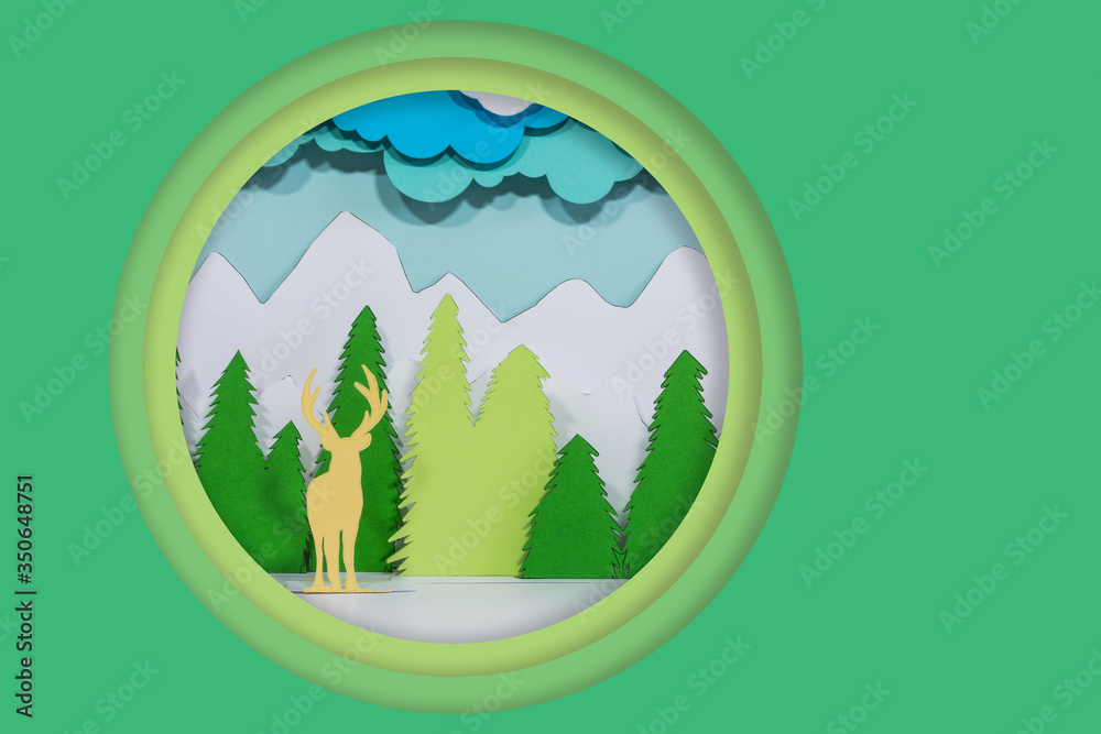 mountain landscape scene with pine trees and elk