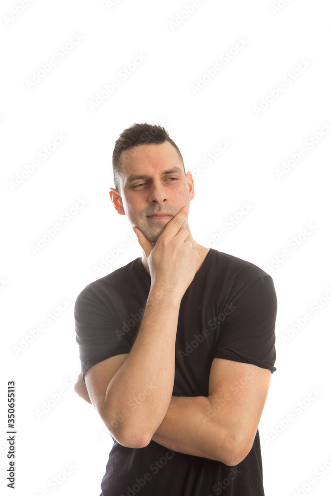 Portrait of a handsome young man thinking on something, isolated on white background Portrait of a handsome young man thinking on something, isolated on white background