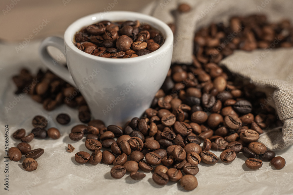 Coffee cup and coffee beans in a bag