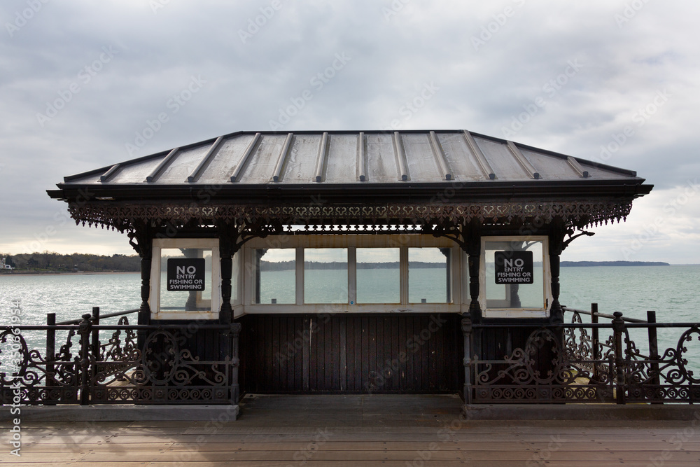 Shelter on the pier with sea or ocean in the background