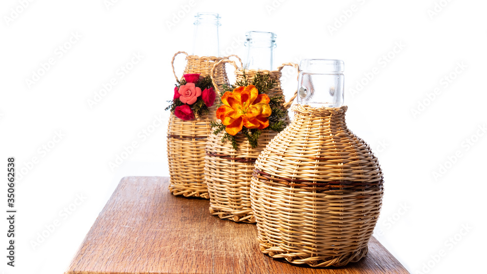 Typical Calabrian handicraft, wicker-covered bottles, Calabria, Italy.