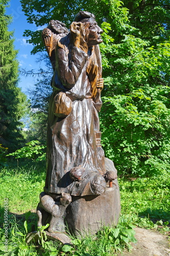 Pereslavl - Zalessky, Russia-August 1, 2017: Pereslavl dendrological garden named after S. F. Kharitonov. Interactive route "Fairy tale Trail". Wooden sculpture fairy-tale character "Baba Yaga"