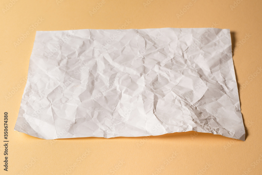 Obraz premium Crumpled white paper background.