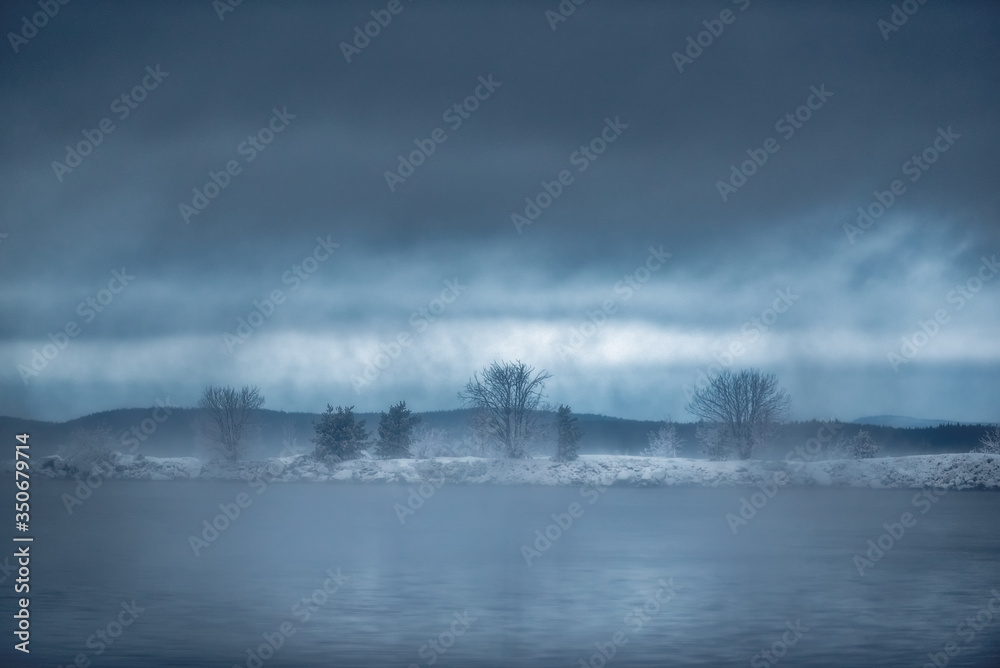 Fototapeta premium In the fog. Fog over Lake Babinskaya Imandra in the Arctic in the north of the Murmansk region