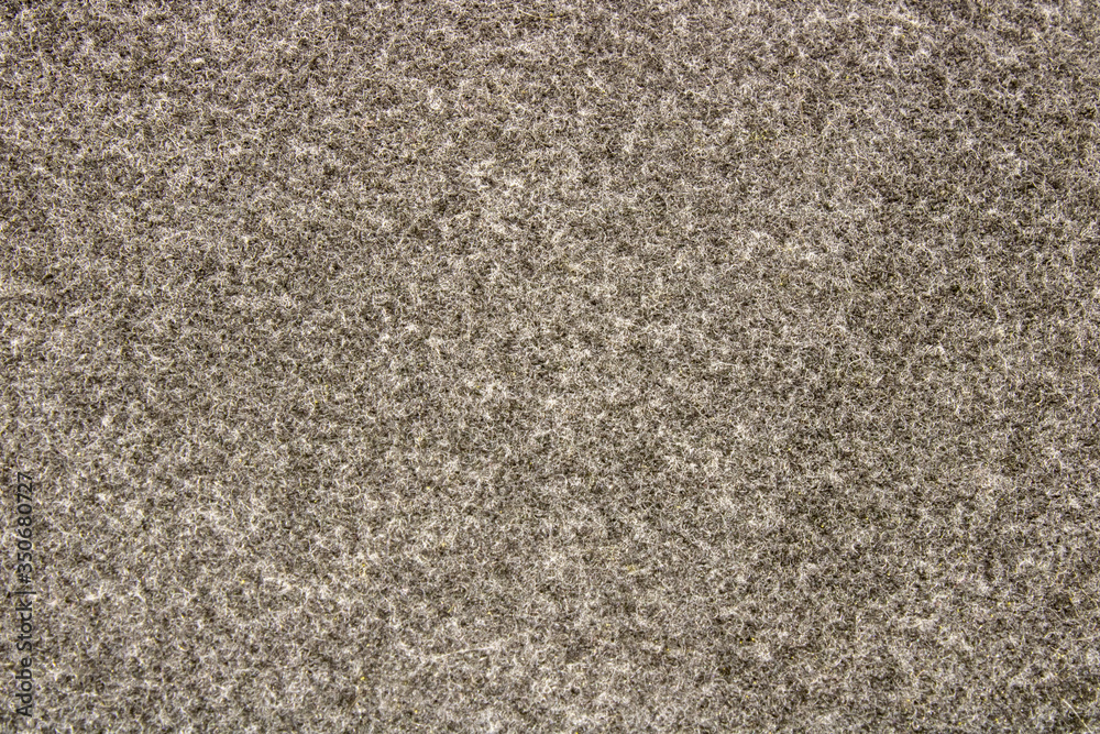 Macro close-up of gray office carpet for background, texture and pattern. Macro close-up of gray office carpet for background, texture and pattern.