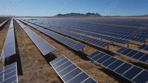 Aerial of solar panels on solar farm in desert