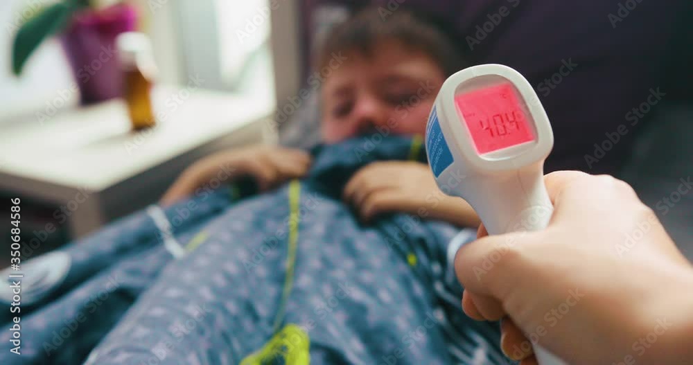 Viral disease. Measles rash. Child with viral infection measles lies in