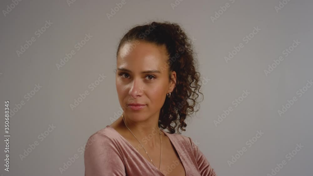 Confident Woman Smiles at Camera Confident Woman Smiles at Camera