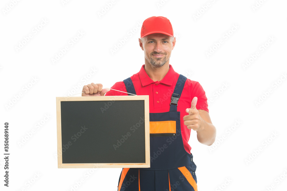 Planning a new construction. presenting useful information. man in overall with empty board. place for copy space. announcement concept. male construction worker with presentation Planning a new construction. presenting useful information. man in overall with empty board. place for copy space. announcement concept. male construction worker with presentation