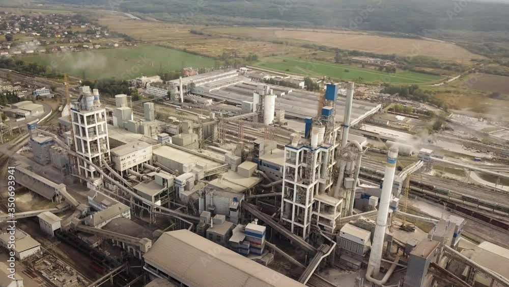 Aerial view of cement plant factory at industrial production area. Aerial view of cement plant factory at industrial production area.