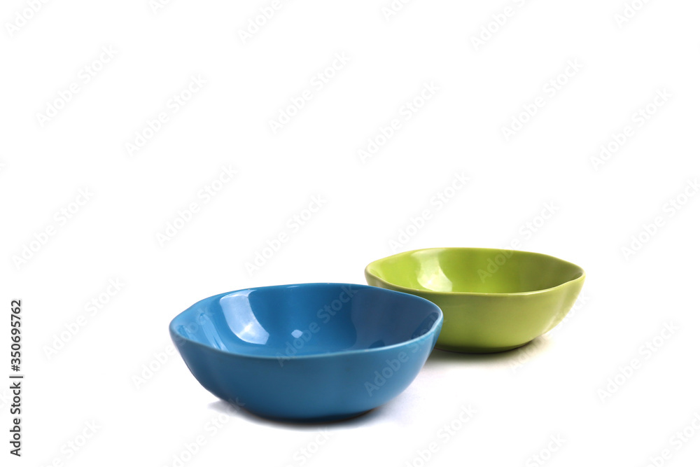 two ceramic colourful bowls, isolated two ceramic colourful bowls, isolated