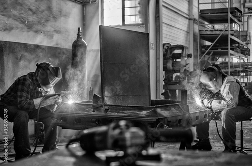 Welder at work, welding iron 