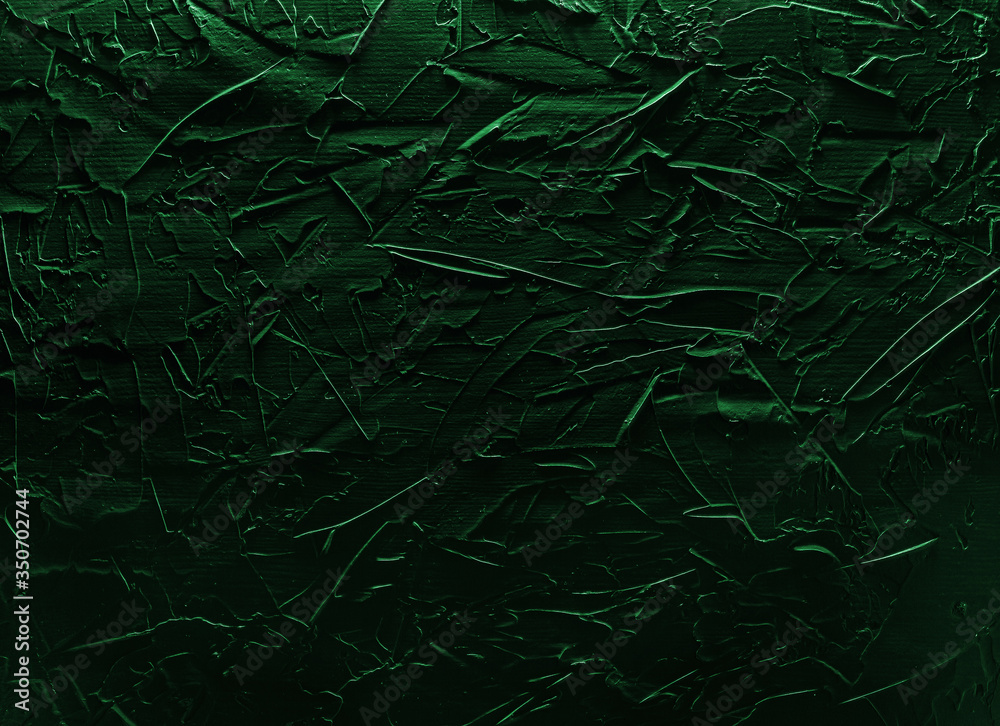 Part of the wall of a beautiful abstract loft decorative green emerald stucco. Art cover stylized textural banner with space for text decoration. Part of the wall of a beautiful abstract loft decorative green emerald stucco. Art cover stylized textural banner with space for text decoration.