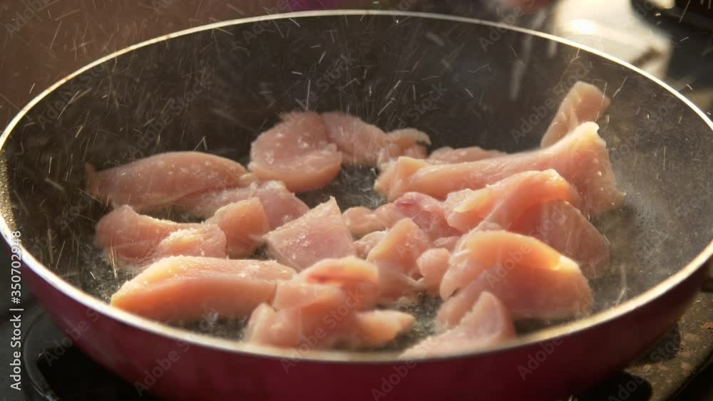 chicken squash in oil in a pan, 4k chicken squash in oil in a pan, 4k