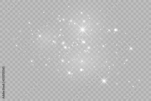 Dust white. White sparks and golden stars shine with special light. Vector sparkles on a transparent background. photo