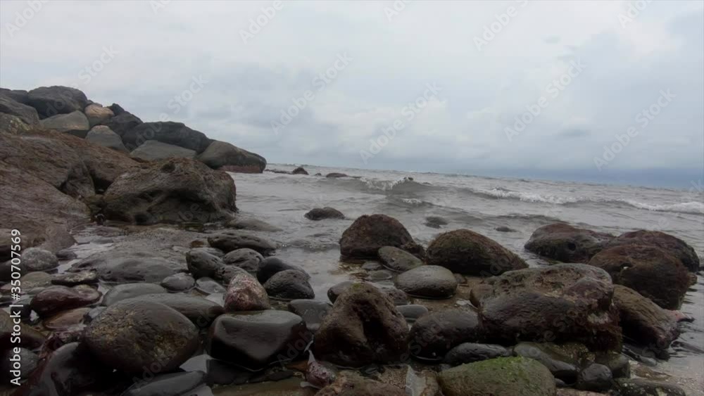 small waves crashing on the rocks at Launiupoko, slow motion capture small waves crashing on the rocks at Launiupoko, slow motion capture
