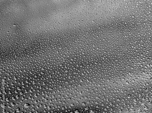 water drops on the gray glass close-up.