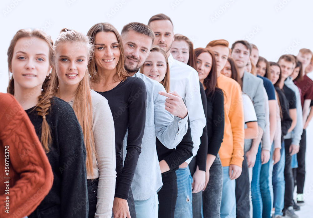 group of diverse young people standing in line group of diverse young people standing in line